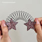 Peigne flexible « Invisible Grip » pour cheveux rebelles